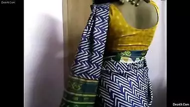 Money is received by Desi MILF performing XXX striptease on camera