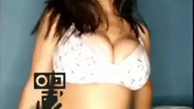 Sexy busty bitch teasing with her big boobs on cam