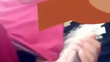Naughty girlfriend gives handjob to bf